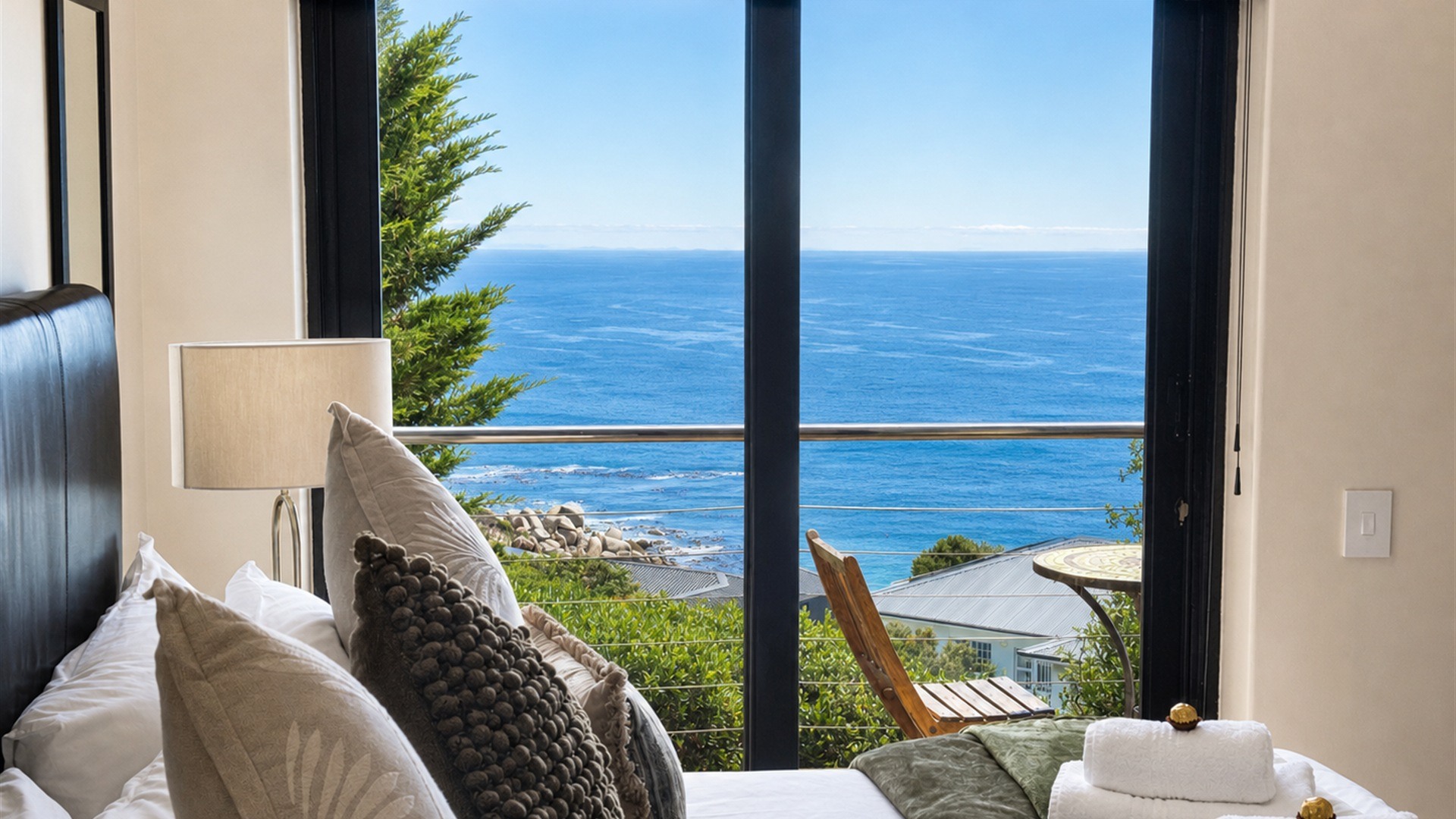 Fynbos suite bedroom overlooking False Bay at Aqua Terra in Simon's Town